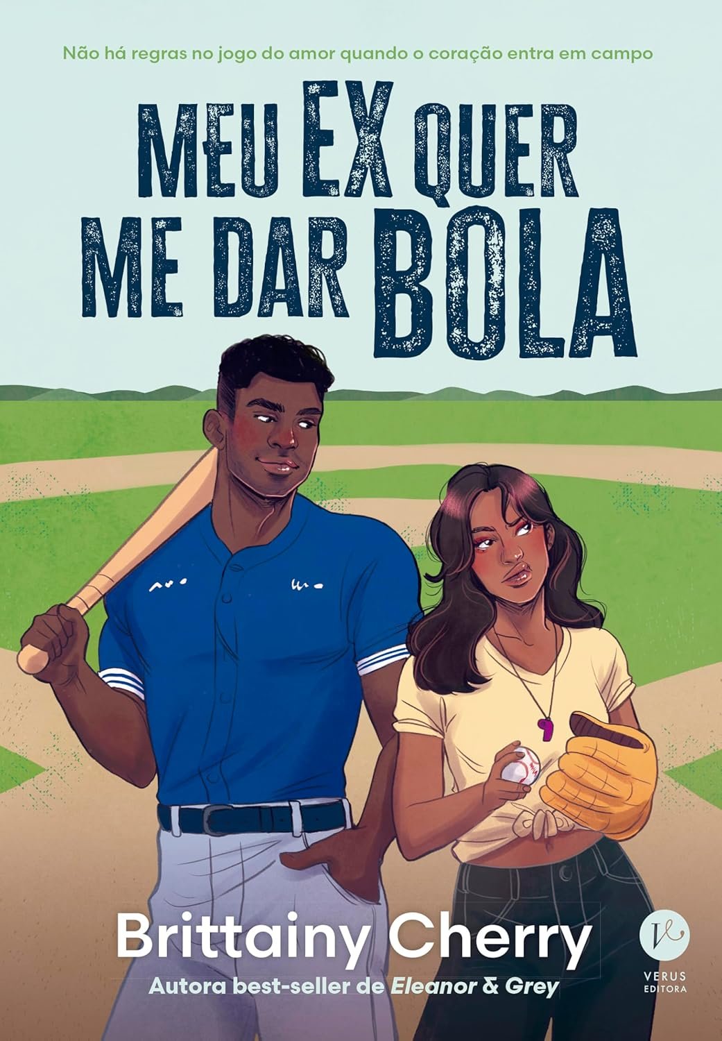 Casal jovem em um estádio de beisebol