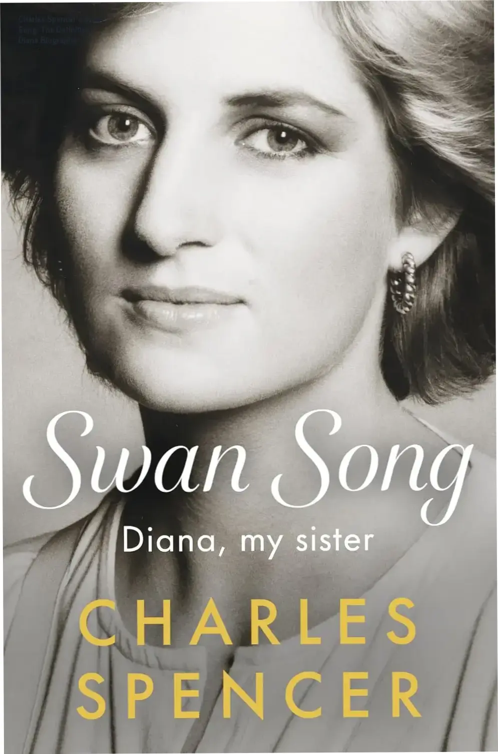 Charles Spencer holding the hardcover book Swan Song, a definitive biography of Princess Diana.